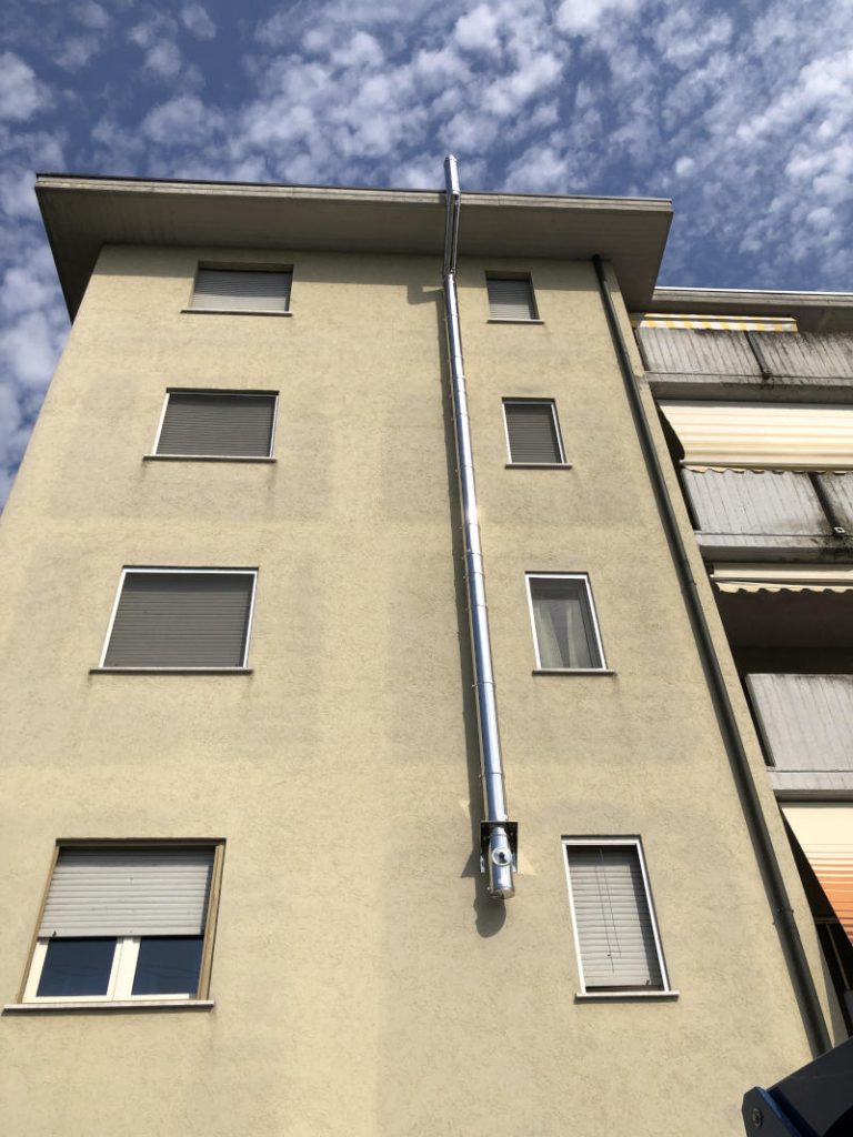 Canna Fumaria esterna sulla facciata - Progetto by Climaterm